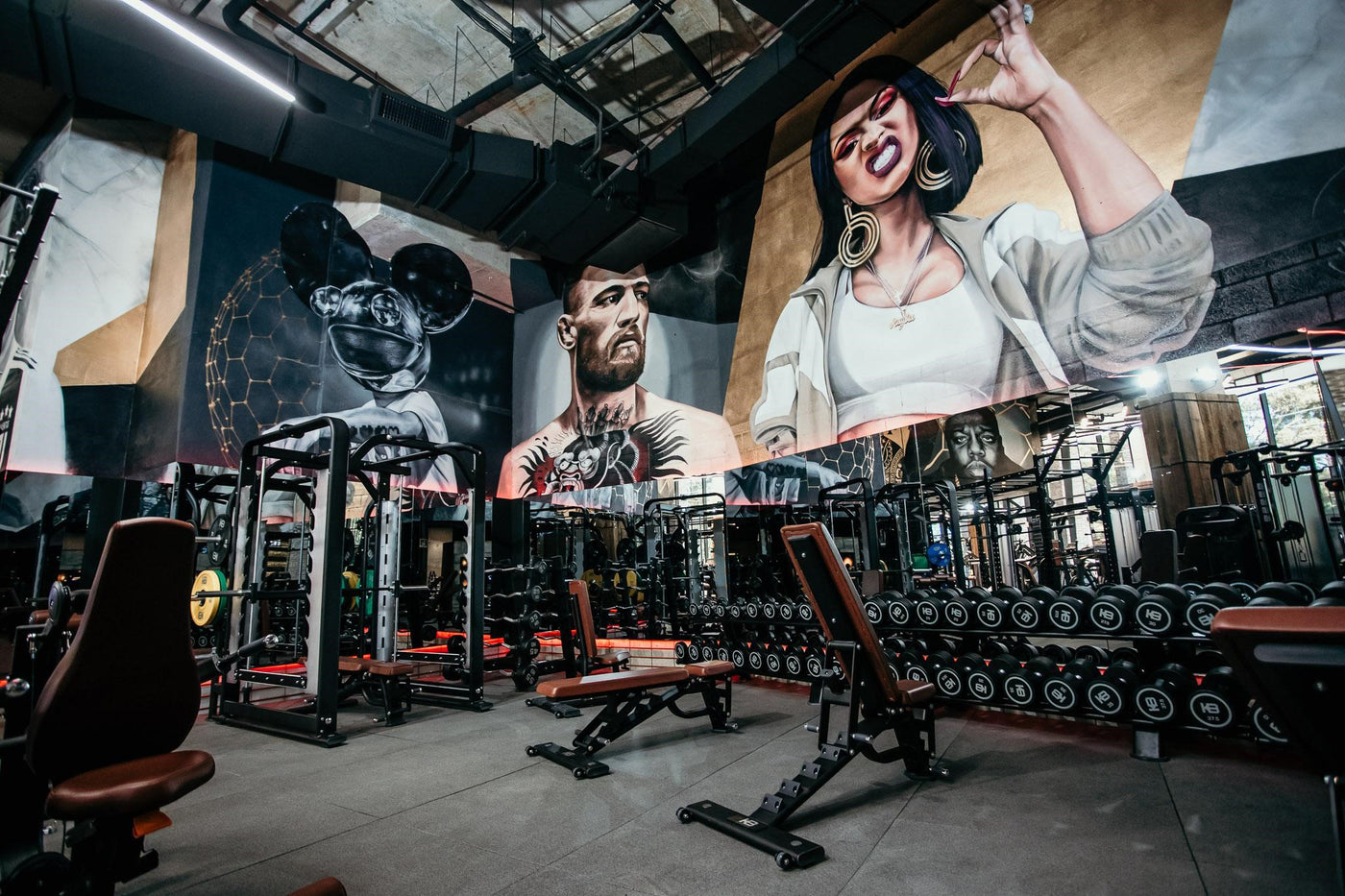 King Beats gym floor in Glebe with murals and strength machines
